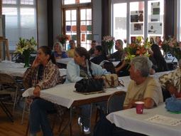 Guests being attentive to Language presentation and food display